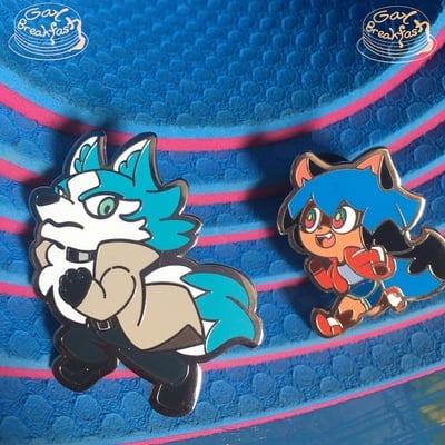 Elder gay and baby gay pins