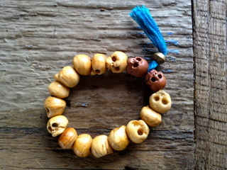 Carved wood skull bracelet