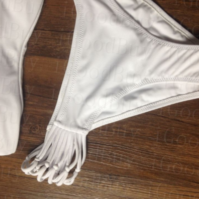 Sexy white pierced bikinis set