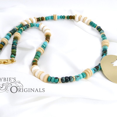 Turquoise and brass wolf necklace