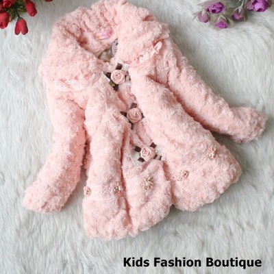 Girls lovely pink coat with roses.