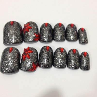 Nails by traveling lacquerista - black with silver glitter and red flowers