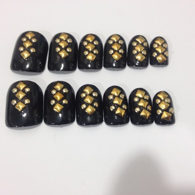 Nails by traveling lacquerista - black with gold studs