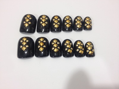 Nails by traveling lacquerista - black with gold studs