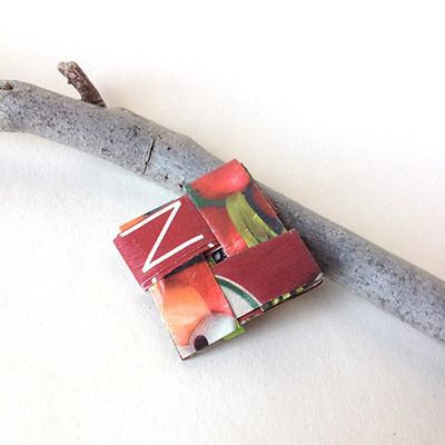 Earth friendly brooch in yummy red
