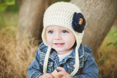 Earflap flower beanie with 4 flowers