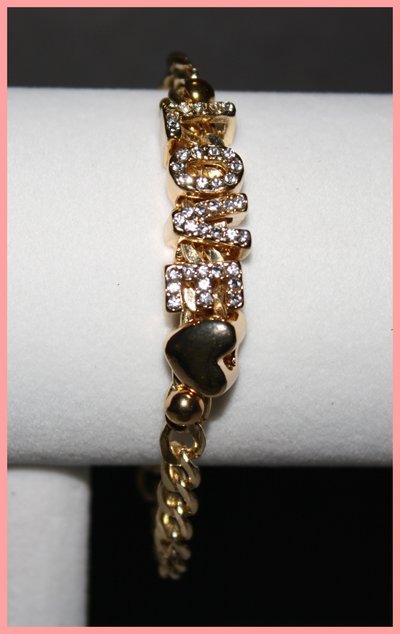 Gold love statement bracelet