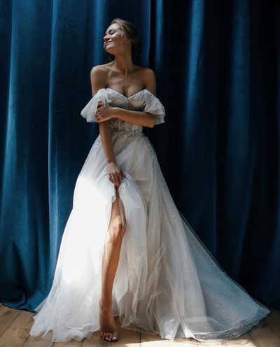 Princess A-Line Off the Shoulder Sparkly Tulle White Wedding Dresses with Lace Appliques