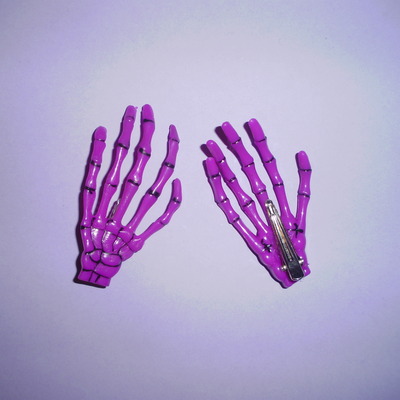 Fuchsia skeleton hand hair clips (pair) 