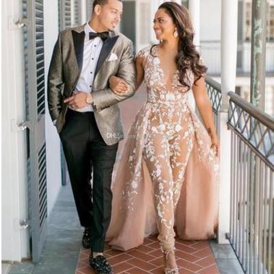 Stunning jumpsuits boho wedding dresses sheer deep v neck beach bridal gowns with detachable train appliqued lace bohemian vestido de novia