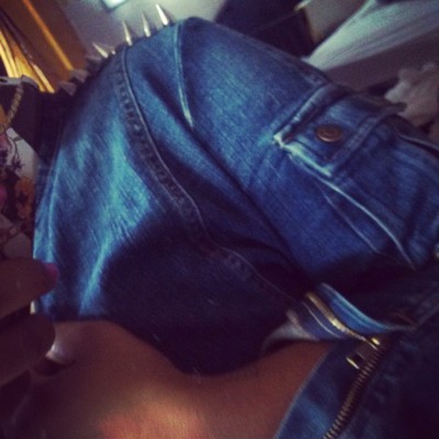 Spiked crossback stretch denim moto jacket - size medium