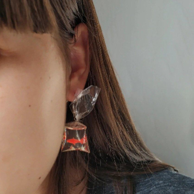 "fish in bag" earrings